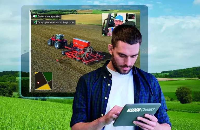 Agriculteur utilisant les service KUHN CCI Connect depuis une tablette